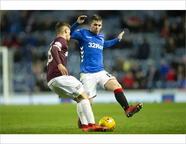 Intense Moment: Jon Flanagan Tackles Jamie Brandon in Rangers vs Hearts Scottish Premiership Clash at Ibrox Stadium