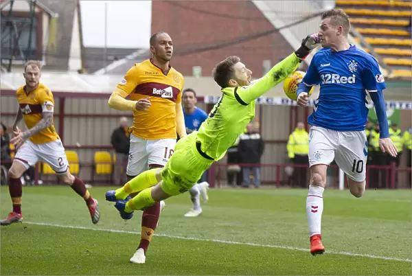 Rangers Steven Davis Leaps Over Motherwell's Mark Gillespie - Scottish Premiership Clash at Fir Park