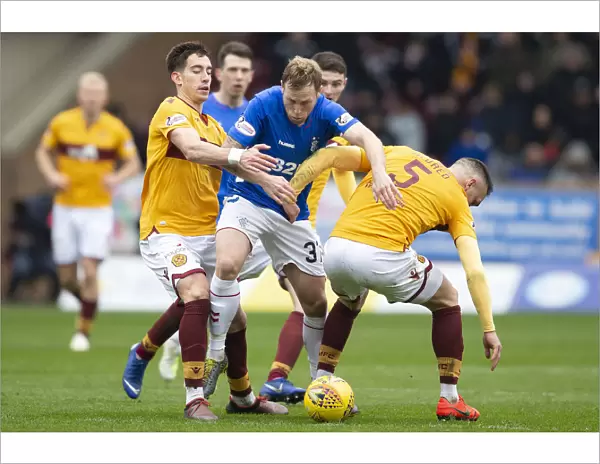 Scott Arfield's Intense Battle for Possession: Motherwell vs Rangers - Scottish Premiership Showdown