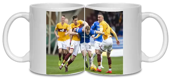 Scott Arfield's Intense Battle for the Ball: Motherwell vs Rangers Scottish Premiership Clash