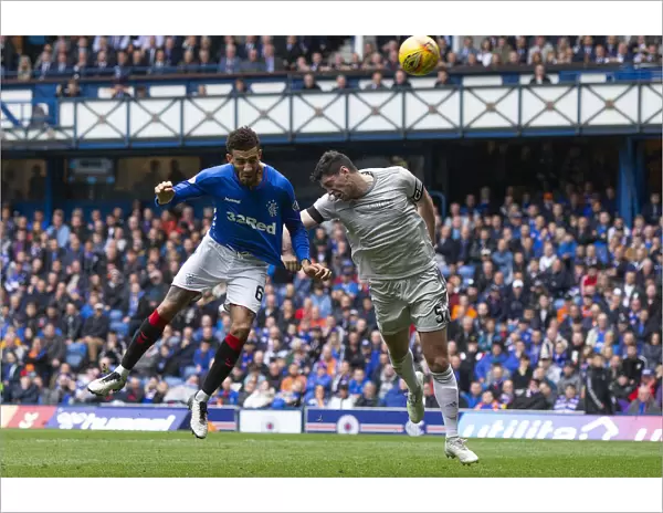 Rangers Connor Goldson Leaps High at Ibrox: Scottish Premiership Clash Against Aberdeen
