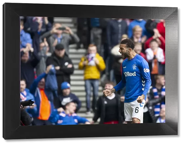 Rangers vs Aberdeen: Goldson Celebrates Tavernier's Penalty Goal in Scottish Premiership at Ibrox