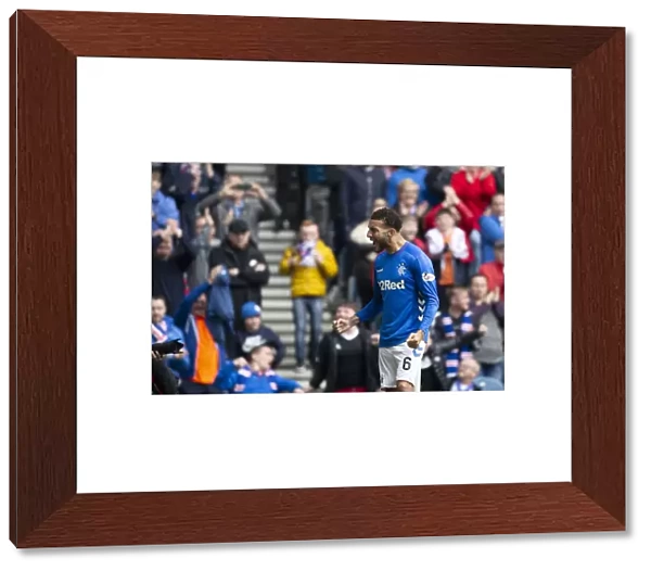 Rangers vs Aberdeen: Goldson Celebrates Tavernier's Penalty Goal in Scottish Premiership at Ibrox