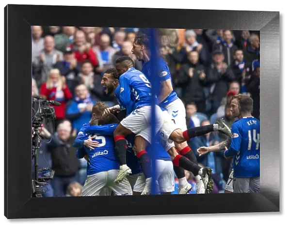 Rangers Football Club: Tavernier's Double Strike and the Triumphant Moment with Team Mates in Scottish Premiership at Ibrox Stadium