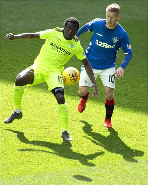Steven Davis vs Thomas Agyepong: Scottish Premiership Clash at Ibrox Stadium - Champions Collide