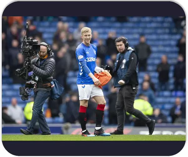 Ross McCrorie's Dramatic Goalkeeping Debut: Celebrating a Red Card Victory at Ibrox Stadium