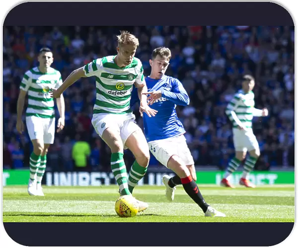 Rangers vs Celtic: Intense Clash Between Ryan Jack and Kristoffer Ajer at Ibrox Stadium