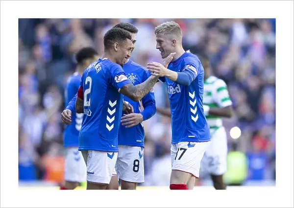 Rangers Triumph: Tavernier and McCrorie Celebrate Scottish Premiership Victory at Ibrox Stadium