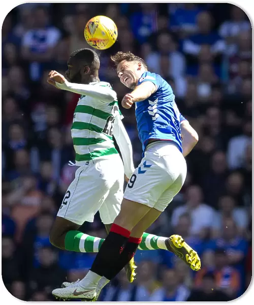 Rangers vs Celtic: Nikola Katic Heads the Ball at Ibrox Stadium - Scottish Premiership Clash