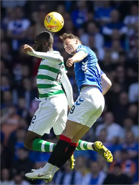 Rangers vs Celtic: Nikola Katic Heads the Ball at Ibrox Stadium - Scottish Premiership Clash