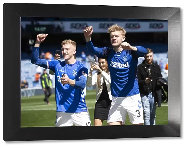 Rangers Triumph: McCrorie and Worrall Rejoice in Scottish Premiership Victory at Ibrox Stadium