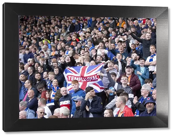 Rangers Fans Unyielding Roar: A Sea of Passion at Rugby Park during Kilmarnock vs Rangers (Scottish Premiership, Scottish Cup Winners 2003)