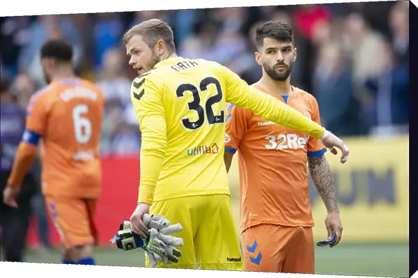 Rangers Firth and Candeias Celebrate Victory at Rugby Park