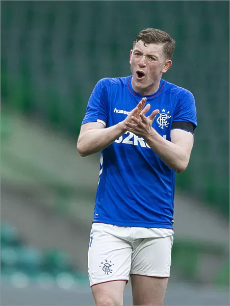 Intense Moment: Daniel Finlayson of Rangers Faces Off Against Celtic in the City of Glasgow Cup Final