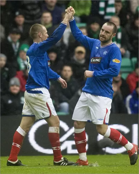 Rangers Miller and Boyd: A Celebratory Moment in Hibernian's 1-4 Defeat (Clydesdale Bank Premier League)