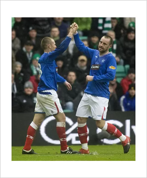 Rangers Miller and Boyd: A Celebratory Moment in Hibernian's 1-4 Defeat (Clydesdale Bank Premier League)