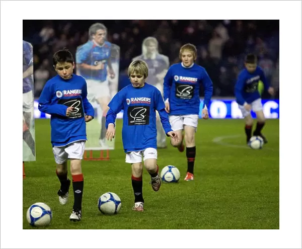 Rangers Kids Shine: A Spectacular Half Time Display of Football Skills at Ibrox (3-0 Rangers vs. St. Johnstone)