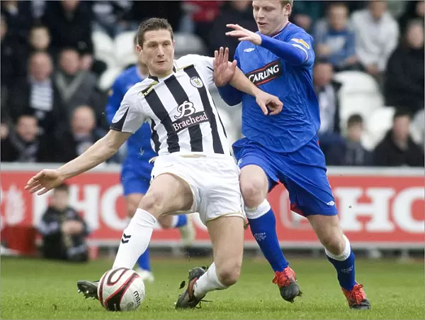 Titanic Tackle: Naismith vs Mehmet in Scottish Cup Fifth Round Clash at St Mirren Park (0-0)