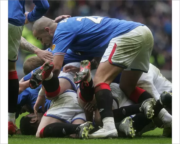 Euphoria at Ibrox: Maurice Edu Scores Game-Winning Goal for Rangers against Celtic (Clydesdale Bank Premier League)
