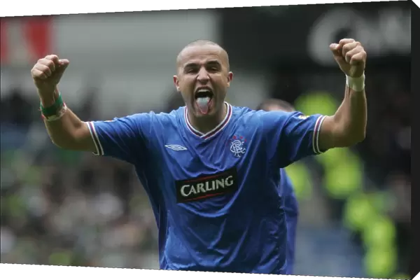 Bougherra's Euphoric Celebration: Rangers 1-0 Victory Over Celtic in the Clydesdale Bank Premier League