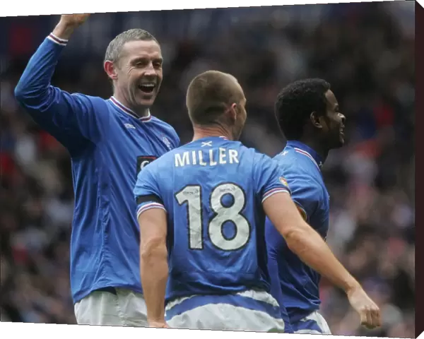 Rangers vs Celtic: David Weir and Kenny Miller Celebrate Maurice Edu's Game-Winning Goal (1-0) at Ibrox, Clydesdale Bank Premier League
