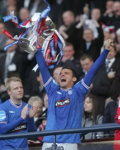 Rangers Football Club: Lee McCulloch Lifts the Co-operative Insurance Cup at Hampden