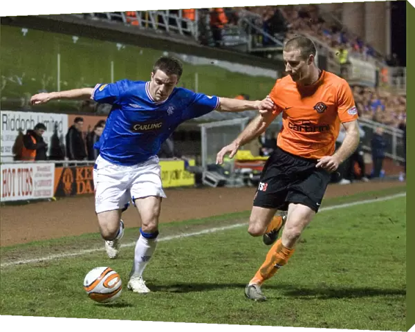 A Tight Battle: Dundee United's Sean Dillon Outshines Rangers Andrew Little in Scottish Cup Quarter Final Replay - 1-0 to Dundee United