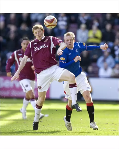 Rangers Steven Naismith Fights Past Hearts Jason Thomson: Rangers Dominance in Clydesdale Bank Premier League Match (Hearts 1-4 Rangers)