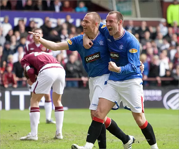 Rangers Miller and Boyd: A Dynamic Duo Celebrates Goal in Hearts 1-4 Rangers Victory (Clydesdale Bank Premier League)