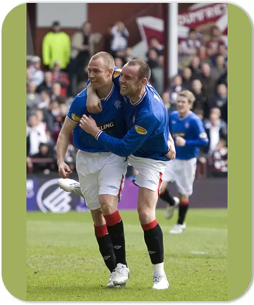 Rangers Miller and Boyd: Unstoppable Duo Celebrates Goal in Hearts 1-4 Rangers Victory (Clydesdale Bank Premier League)