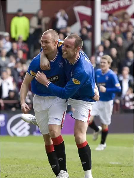 Rangers Miller and Boyd: Unstoppable Duo Celebrates Goal in Hearts 1-4 Rangers Victory (Clydesdale Bank Premier League)