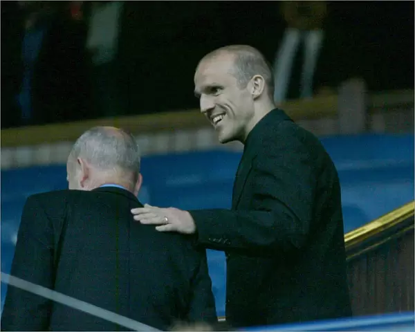 Alex Rae takes in the Hearts game