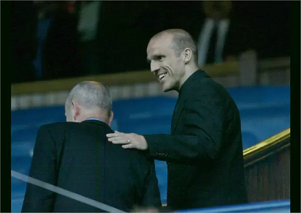 Alex Rae takes in the Hearts game