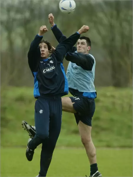 Steven Thompson and Hamed Namouchi in Focus: Training at Murray Park, February 2004