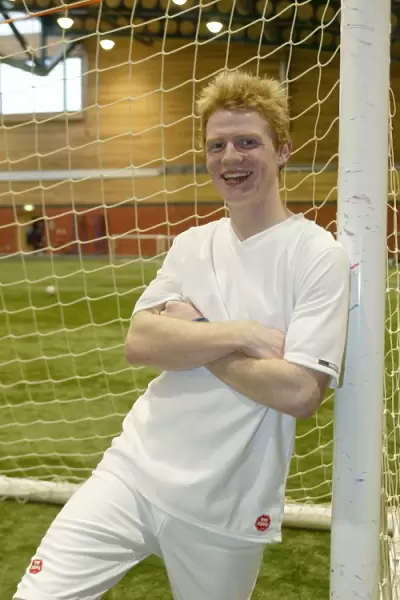 Chris Burke of Rangers FC: Gear Up in Windstopper's Element-Defying Attire
