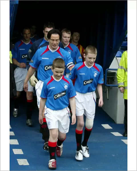 Rangers Football Club: Michael Mols and Mascots Celebrate Victory over Partick Thistle (April 17, 2004)