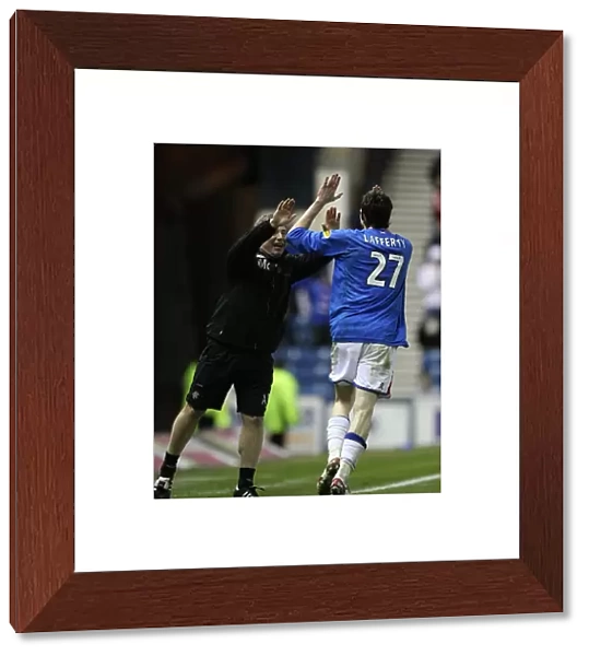 Rangers Kyle Lafferty and Ally McCoist: A Jubilant Moment at Ibrox After Lafferty's Goal vs Aberdeen (3-1)