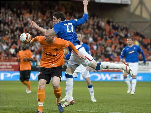 Rangers vs Dundee United: A Tie at Tannadice Park - Kyle Lafferty's Leap Over Garry Kenneth