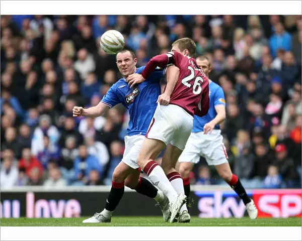 Intense Rivalry: Kris Boyd vs Marius Zaliukas Battle at Ibrox - Rangers 2-0 Hearts, Clydesdale Bank Scottish Premier League
