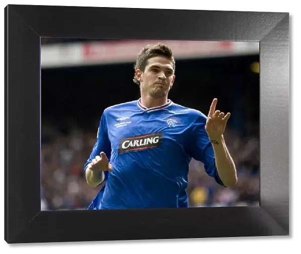 Rangers Football Club: Kyle Lafferty's Double Strike - Securing the SPL Championship Title at Ibrox Stadium