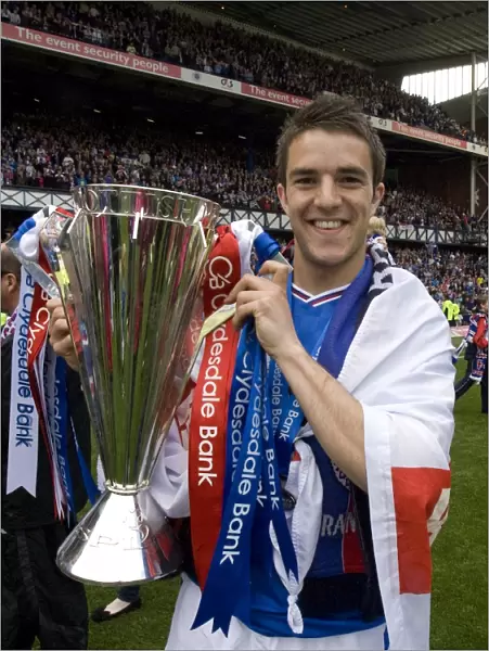 Rangers Football Club: SPL Champions - Andrew Little Celebrates Victory with the Trophy at Ibrox Stadium