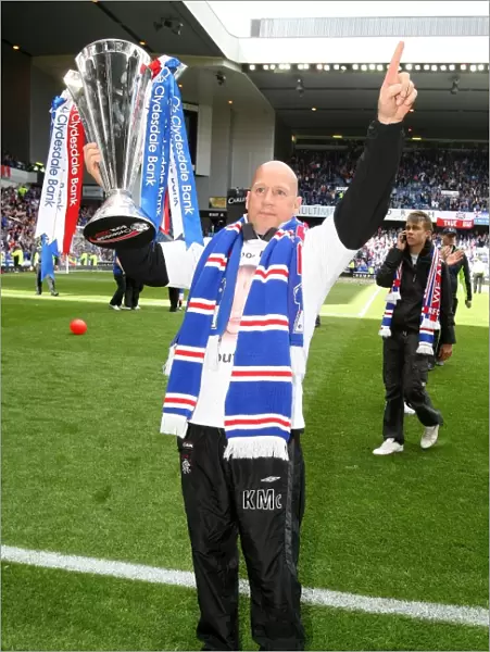 Rangers Football Club: SPL Champions - Kenny McDowall Celebrates with the Trophy at Ibrox Stadium