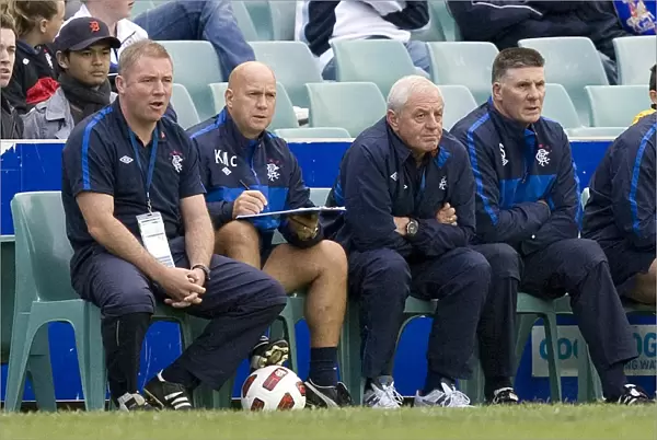 Rangers FC: Ally McCoist, Walter Smith, Kenny McDowall, and Jim Stewart in Deep Conversation on the Touchline at Sydney Festival of Football 2010 vs Blackburn Rovers