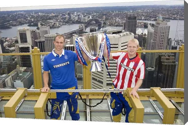 Rangers Whittaker and Naismith Celebrate SPL Title at Sydney Tower with Harbour Bridge Backdrop