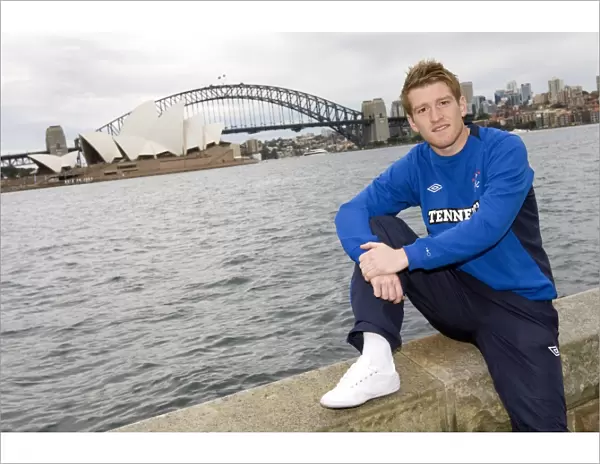 Rangers Steven Davis Contemplates Sydney's Iconic Opera House and Harbour Bridge at the 2010 Festival of Football