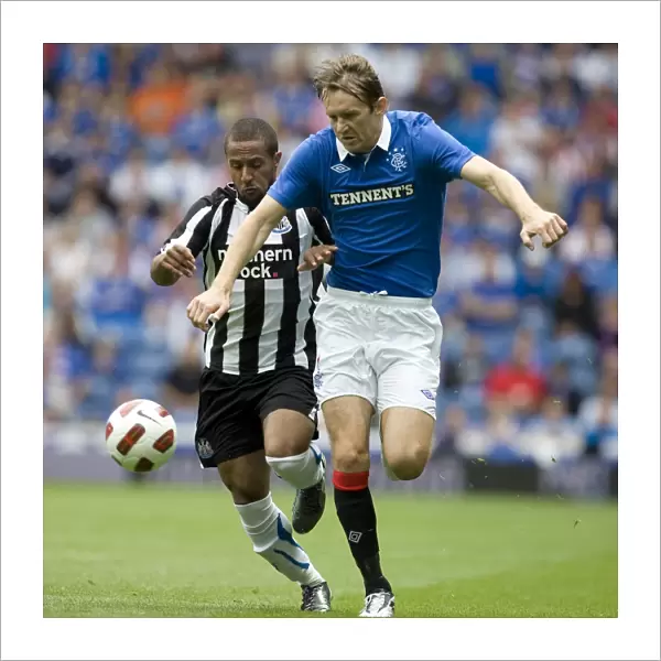 Rangers vs Newcastle United: Sasa Papac Stands Firm Against Wayne Routledge in Thrilling Ibrox Pre-Season Clash (2-1)