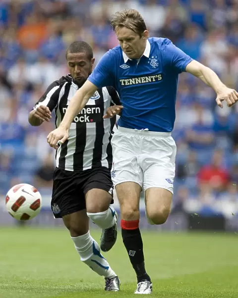 Rangers vs Newcastle United: Sasa Papac Stands Firm Against Wayne Routledge in Thrilling Ibrox Pre-Season Clash (2-1)