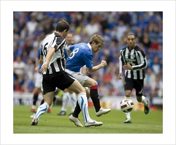 Rangers vs Newcastle United: Steven Davis vs Mike Williamson - Intense Tackle in Ibrox Pre-Season Friendly (2-1)