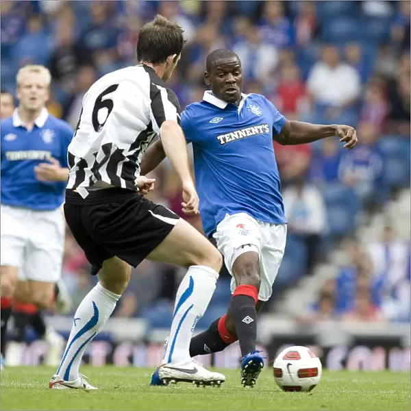 Maurice Edu Wins the Ball: Rangers Pre-Season Victory over Newcastle United (2-1)
