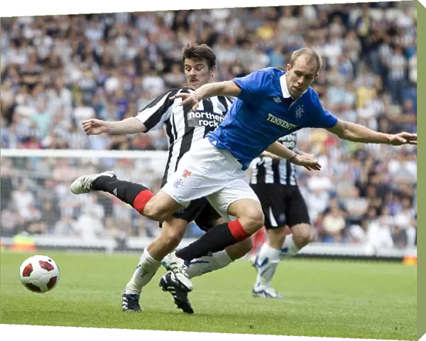 Whittaker Fouled by Barton: Rangers Pre-Season Victory Over Newcastle United (2-1)